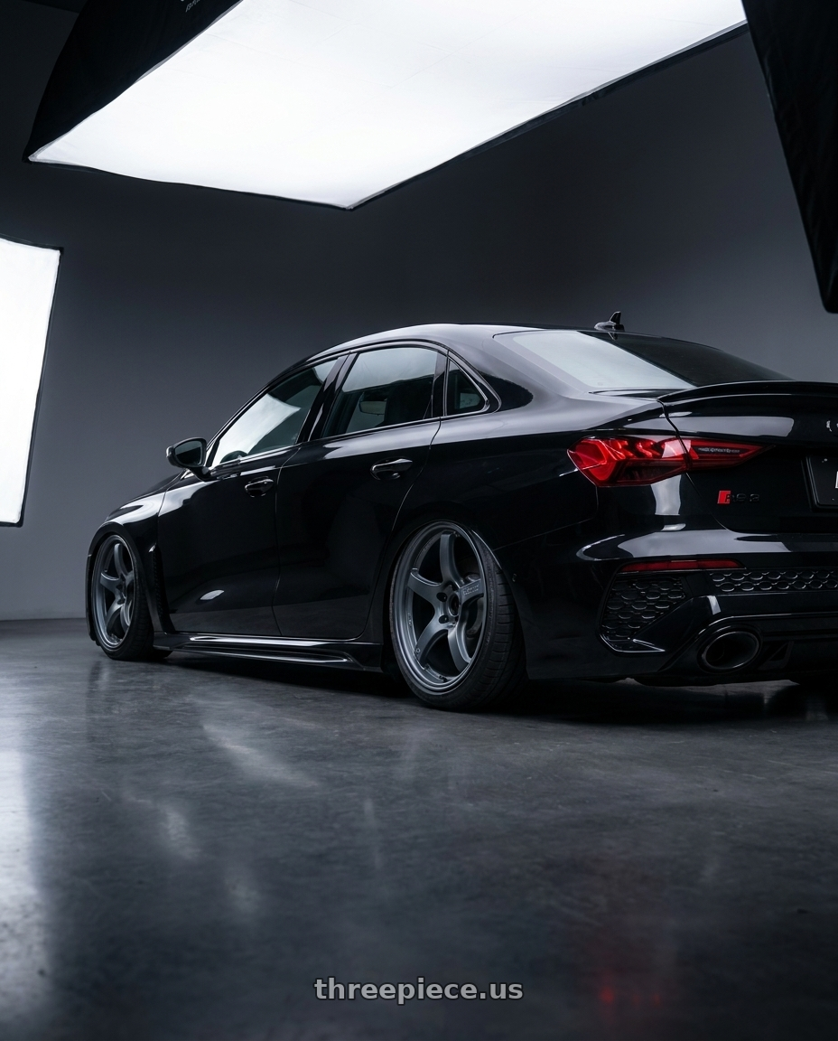 2022 Audi RS3 8Y with Gram Lights 57CR 5x112 19x8.5+45 Gunblue II wheels rear three quarter view slight stretch tires