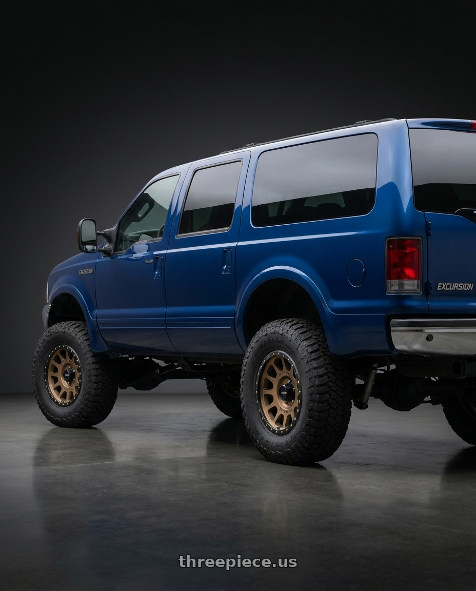 2002 ford excursion blue with Method Race Wheels 305BZ NV 6x139.7 18x9 -12 METHOD BRONZE wheels rear three quarter view meaty tires