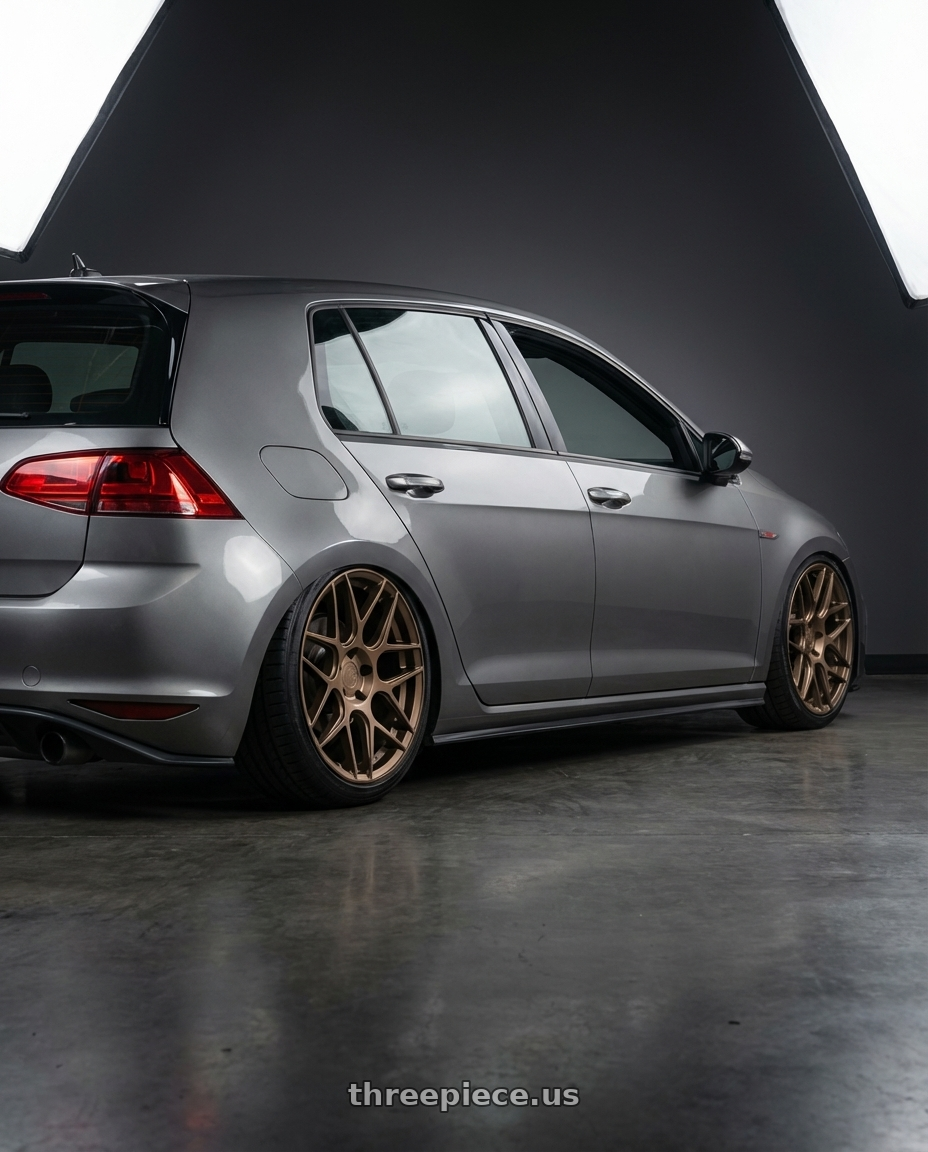 2019 Volkswagen GTI MK7 with Aodhan AFF2 5x112 19x9.5+35 Matte Bronze wheels rear three quarter view slight stretch tires