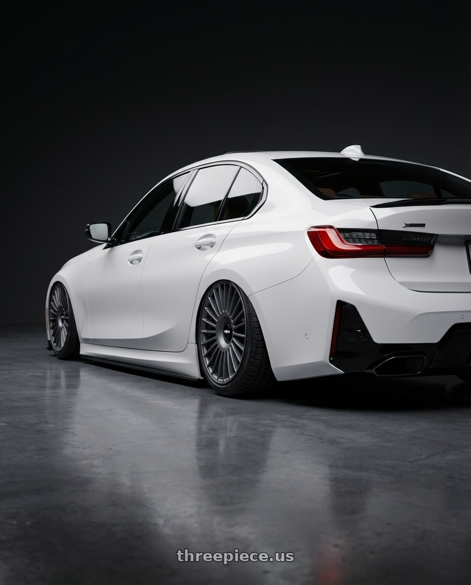 2025 bmw m340xi with Rotiform RC202 GRZ 5X112/5X114.3 19x8.5 +45 MATTE ANTHRACITE wheels rear three quarter view slight stretch tires