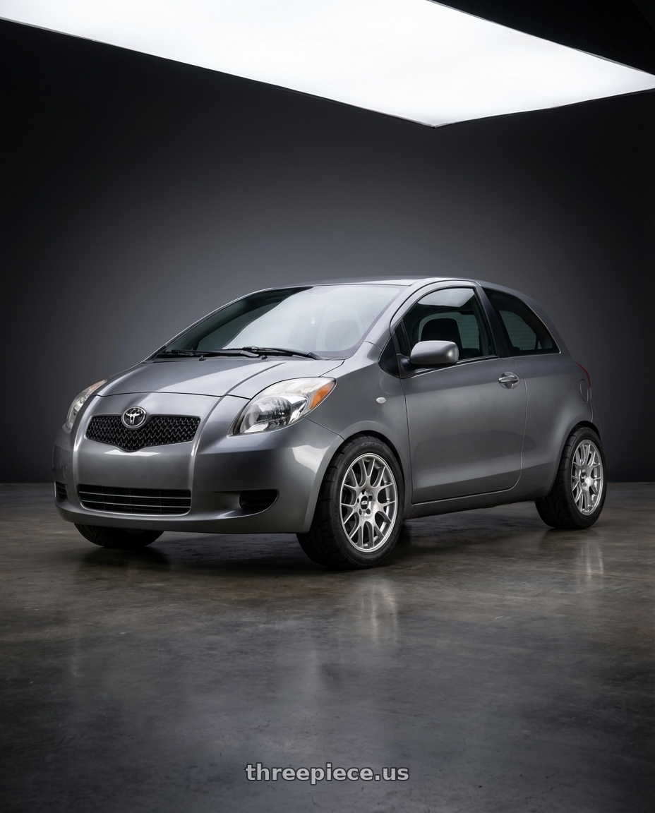 2007 toyota yaris grey with BBS CH-R 5x112 18x8.5 +38 Brilliant Silver Polished Rim Protector wheels front three quarter view lowered stance