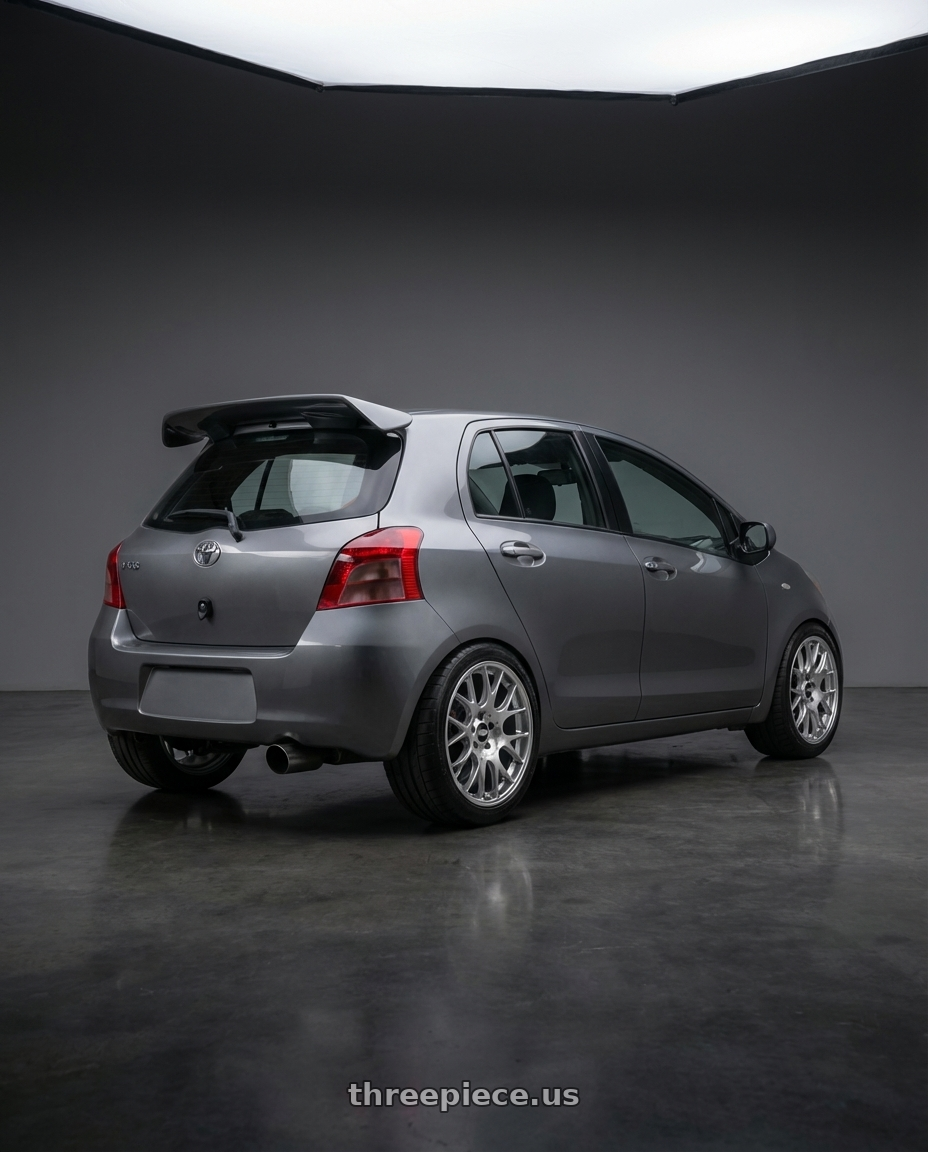 2007 toyota yaris grey with BBS CH-R 5x112 18x8.5 +38 Brilliant Silver Polished Rim Protector wheels rear three quarter view meaty tires