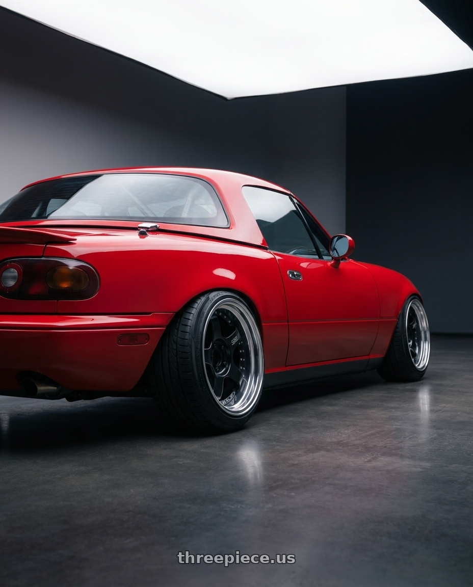 1993 Mazda Miata with SSR Professor SP1R 4X100 16X9.5 32 SL Disk Black wheels rear three quarter view extreme stretch tires