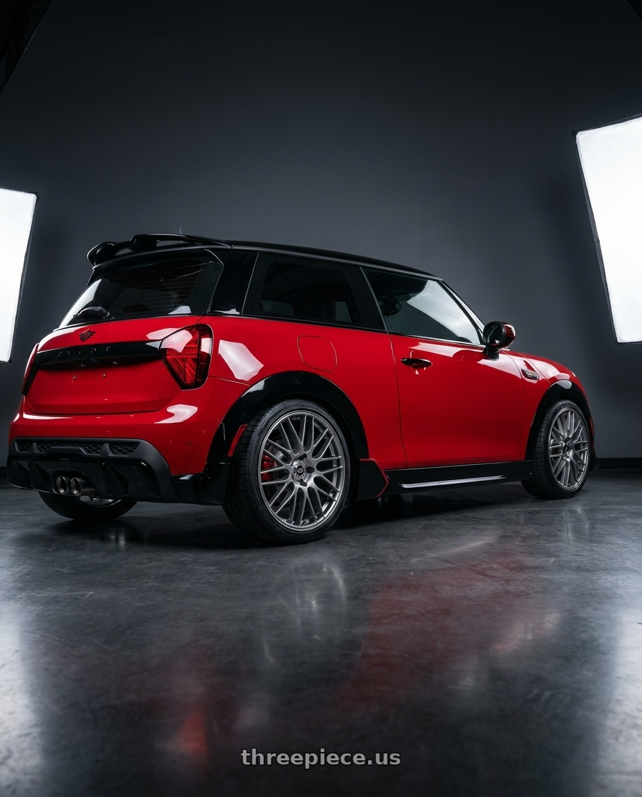2025 mini jcw red with Enkei EKM3 5x112 18x8+35 Hyper Silver wheels rear three quarter view square tires