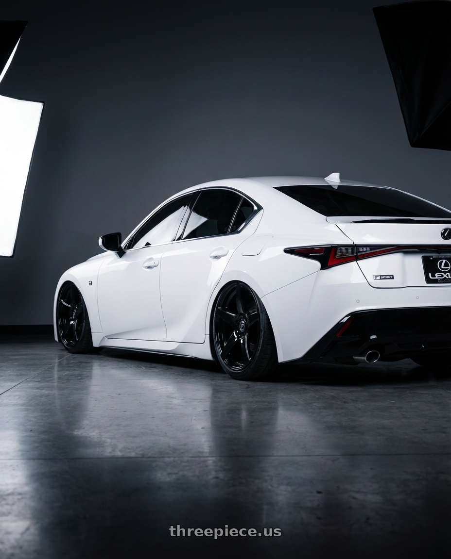2024 Lexus IS 350 with Forgestar CF5 5x114.3 19x10 +42 Gloss Black wheels rear three quarter view slight stretch tires