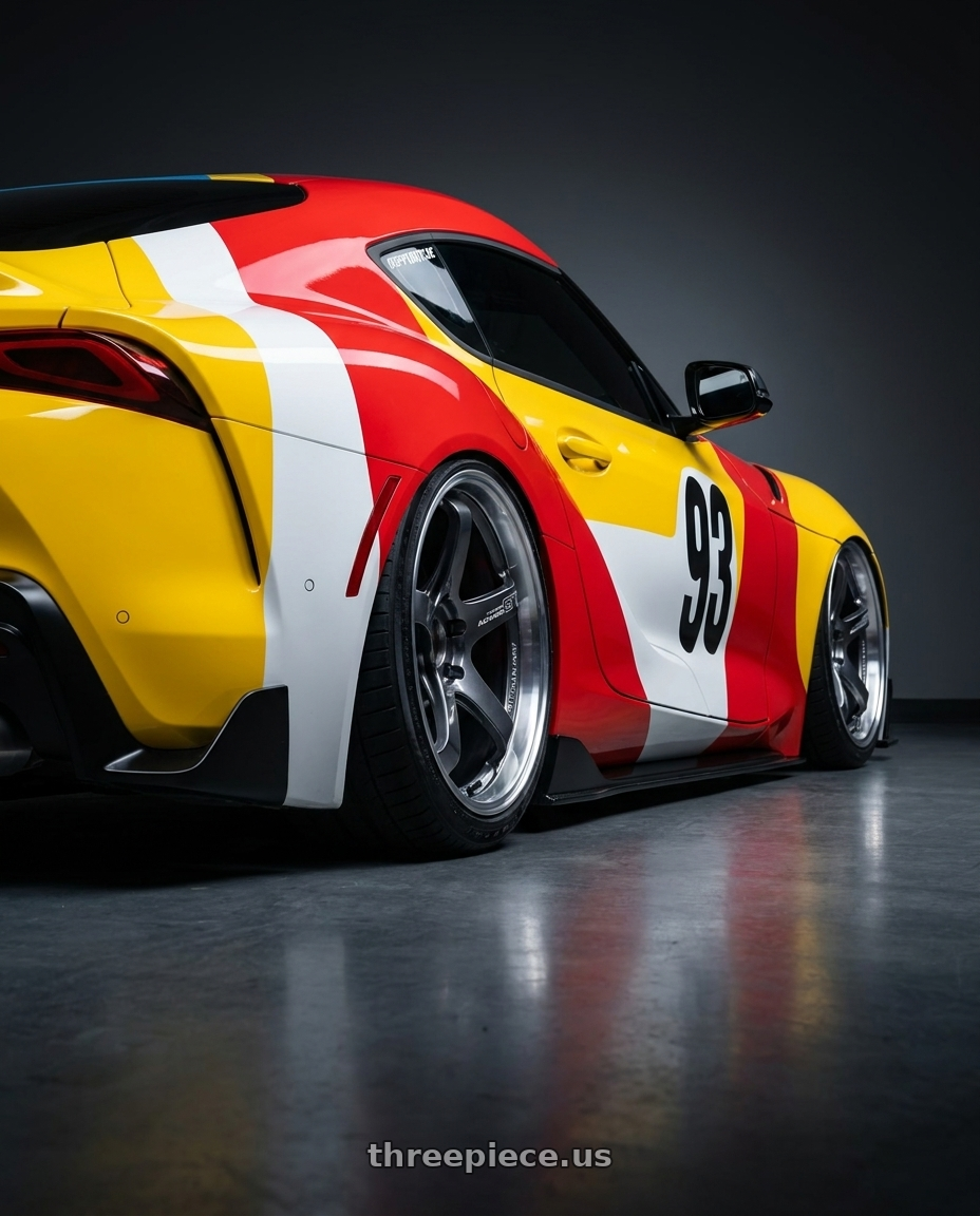 2023 toyota supra with Advan Racing GT BEYOND 5x112 20x11.0 +35 MACHINING & HYPER PLATINUM BLACK wheels rear three quarter view slight stretch tires