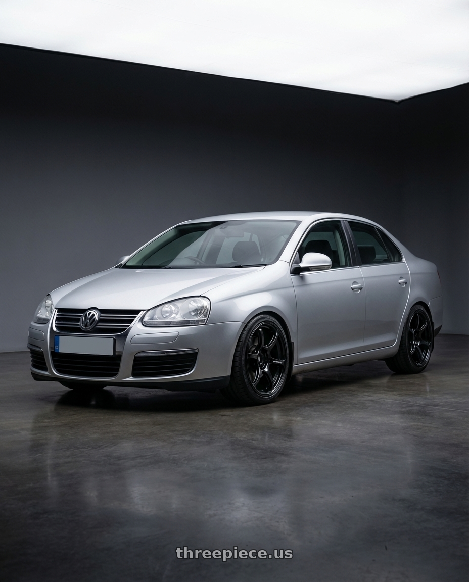 2009 Volkswagen Jetta GLI MK5 with Advan RGIII 5x112 18x8+42 Gloss Black wheels front three quarter view lowered stance