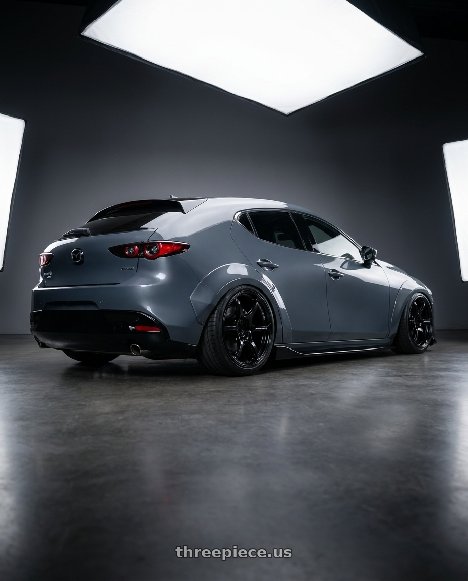 2023 Mazda Mazda3 Turbo with Advan RGIII 5x114.3 18x10.5+15 Gloss Black wheels rear three quarter view slight stretch tires