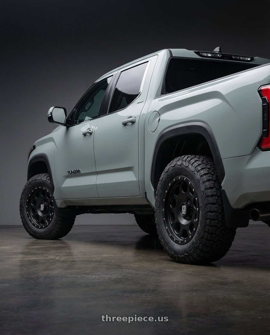 2024 Toyota Tundra with XD XD126 ENDURO PRO 6X139.7 20X10 -24 SATIN BLACK WITH REINFORCING RING wheels rear three quarter view meaty tires