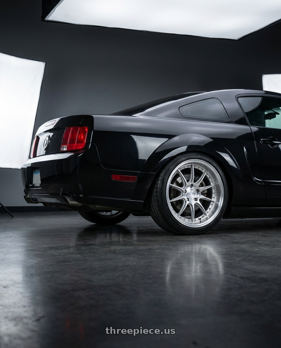 2007 Ford Mustang GT with Aodhan DS07 5x114.3 19x9.5 +30 Silver w/Machined Face wheels rear three quarter view square tires