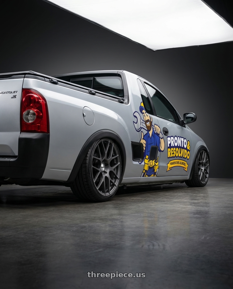 montana conquest 2002 with TSW NURBURGRING 5X114.3 17X7.5 +45 MATTE GUNMETAL wheels rear three quarter view square tires