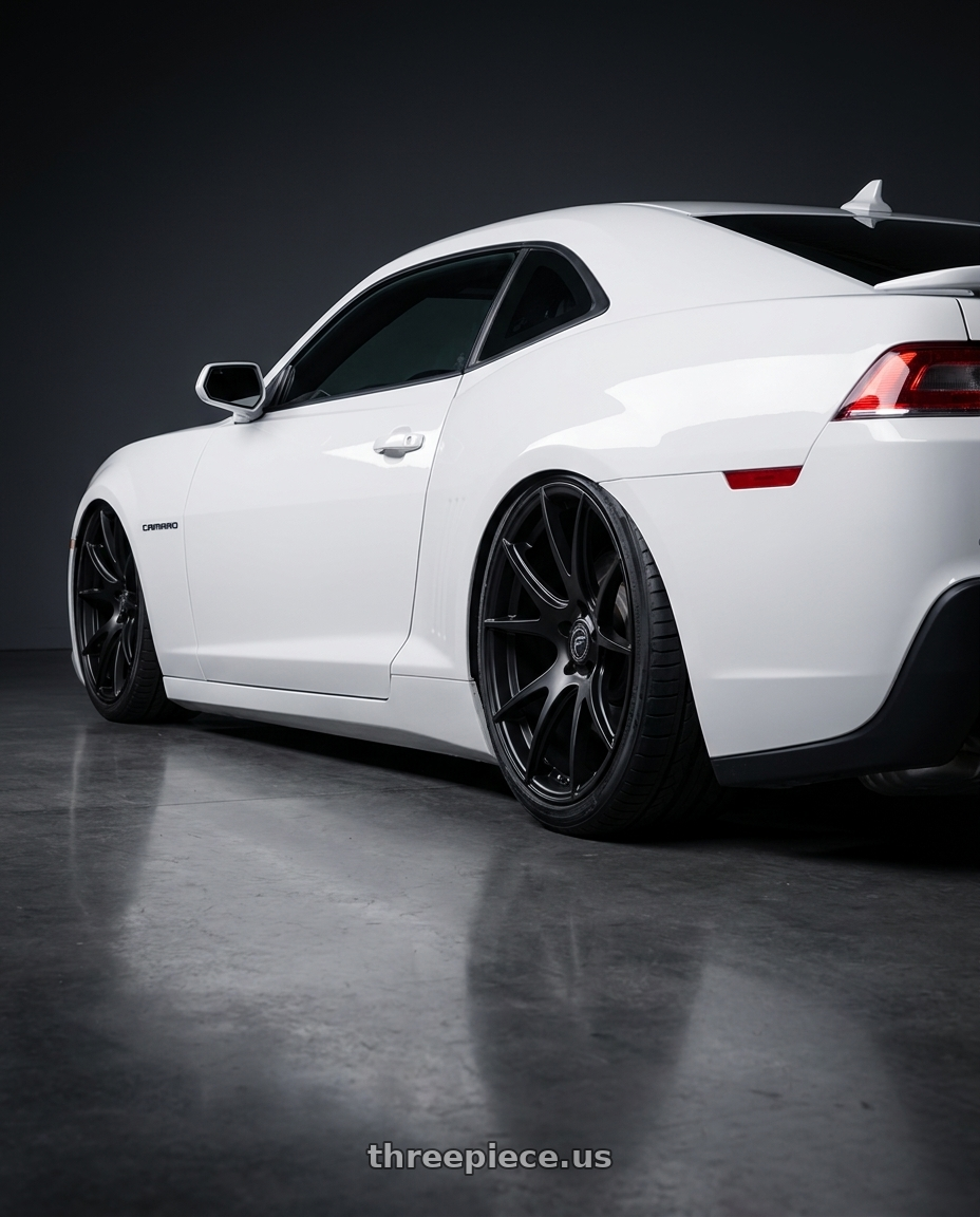 2014 Chevrolet Camaro 5th Gen with Forgestar CF5V 5x120 20x12 +52 Satin Black wheels rear three quarter view slight stretch tires