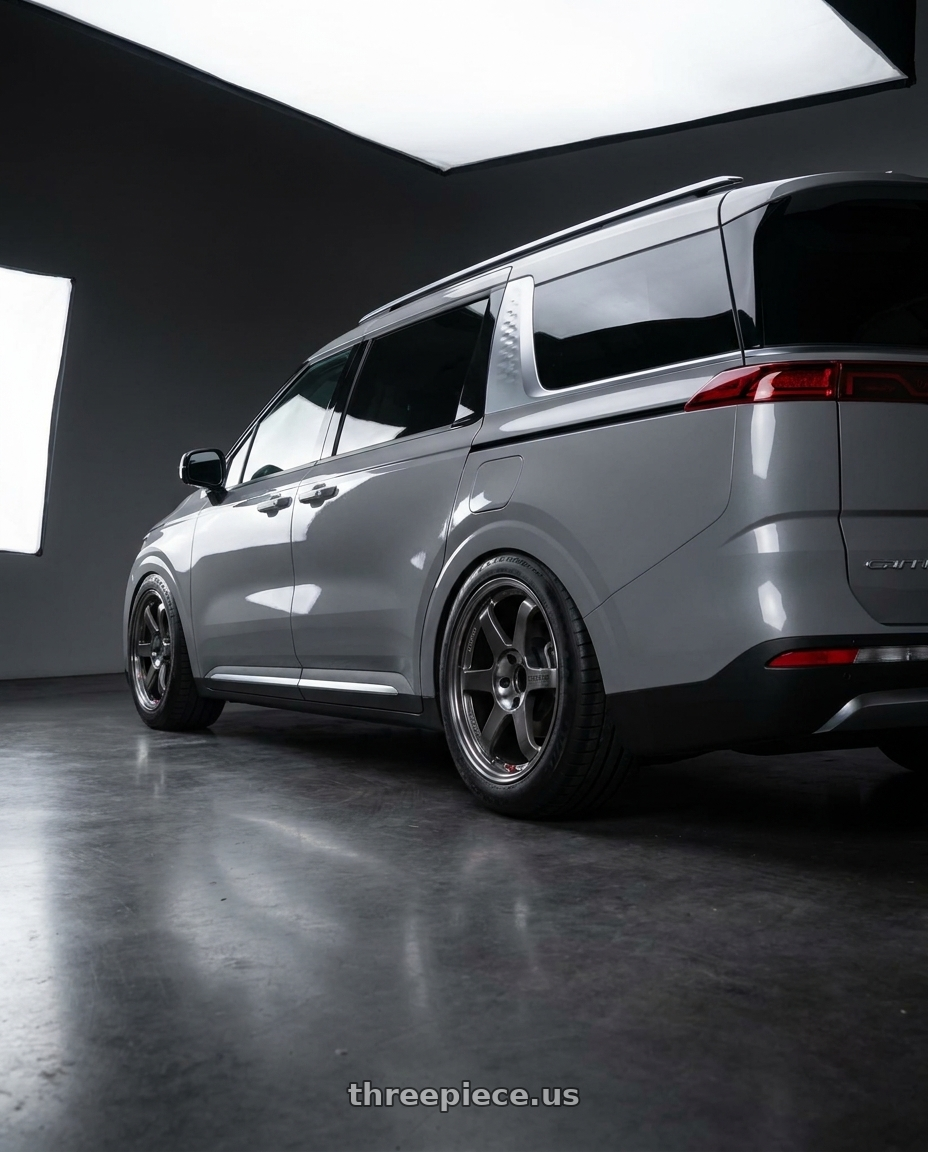 2023 kia carnival grey with Volk Racing TE37SL 5x112 19x9.5 +22 PRESSED GRAPHITE wheels rear three quarter view meaty tires