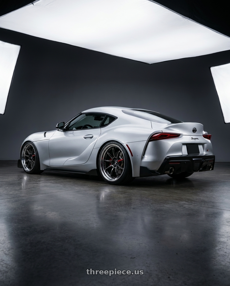 2020 gr supra premium with Work Zr10 2P 5x112 20x11.0 +38 Glim Black wheels rear three quarter view square tires