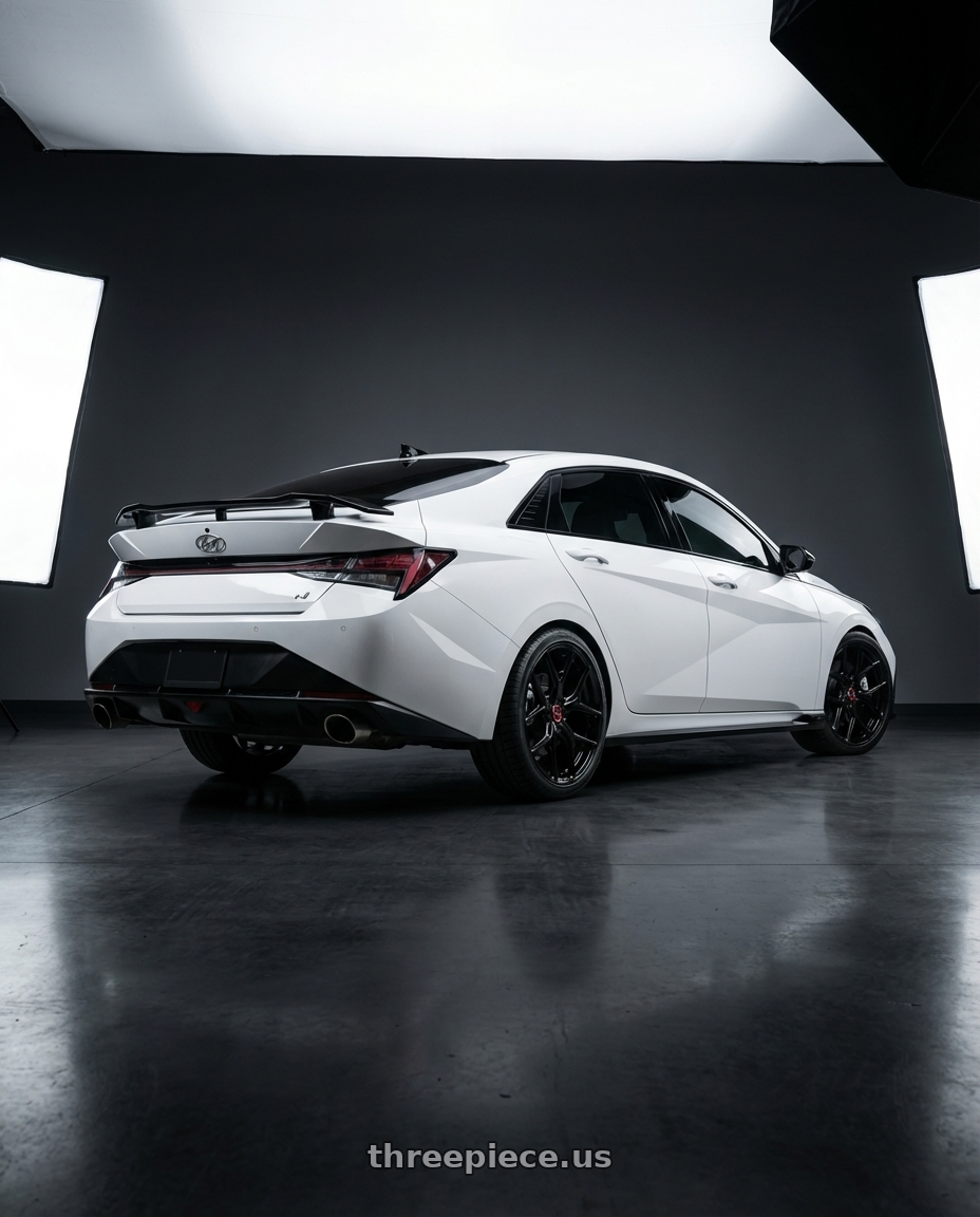 2024 Hyundai Elantra N with Vossen HF-5 19x8.5 / 5x114.3 / ET32 / Flat Face / 73.1 - Gloss Black Wheel - HF5-9N60 wheels rear three quarter view square tires