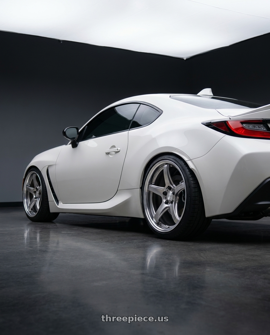 2023 Toyota GR86 White with Work T5R 2P 5x100 18x8.5 +38 GT SILVER wheels rear three quarter view square tires
