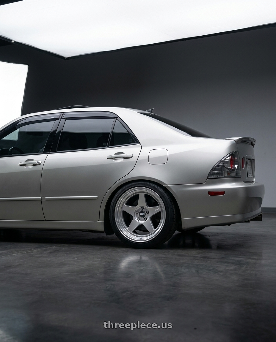2001 Lexus is300 with ESR Wheels CR5 5x114.3 18x8.5 +35 Hyper Silver wheels rear three quarter view square tires