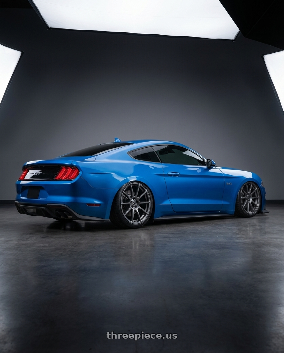 2022 Ford Mustang GT with Forgestar CF10 5x114.3 20x9.5 +29 Gloss Anthracite wheels rear three quarter view slight stretch tires