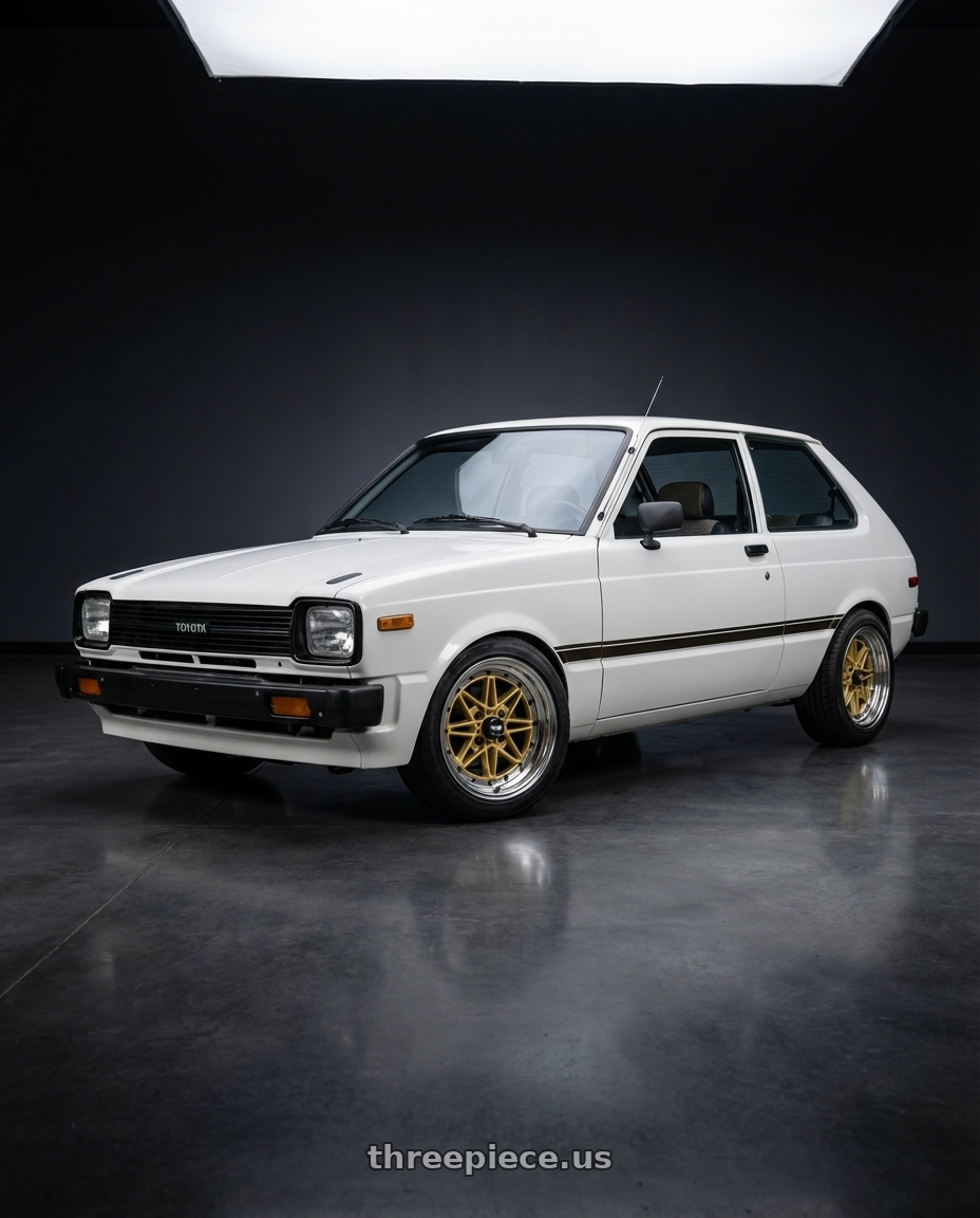 1981 Toyota starlet with EQUIP 03 GOLD 15x7 +7 wheels