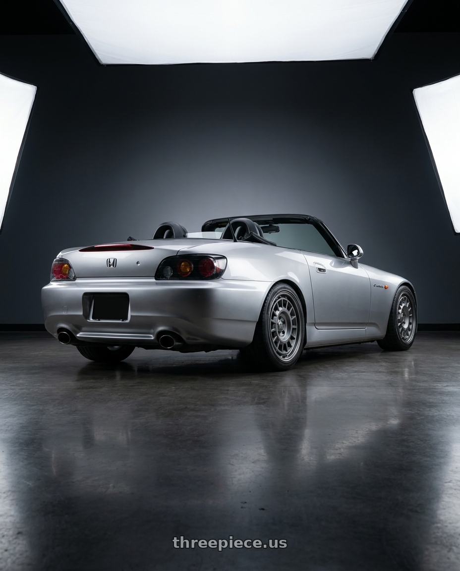 2009 Honda S2000 with fifteen52 ALPEN MX 5x114.3 17x8 +38 FROSTED GRAPHITE (SATIN GREY) wheels rear three quarter view square tires
