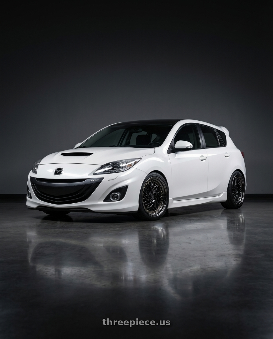 2012 Mazda Mazdaspeed3 with Aodhan DS03 5x114.3 18x9.5 +30 Black Vacuum w/ Gold Rivets wheels