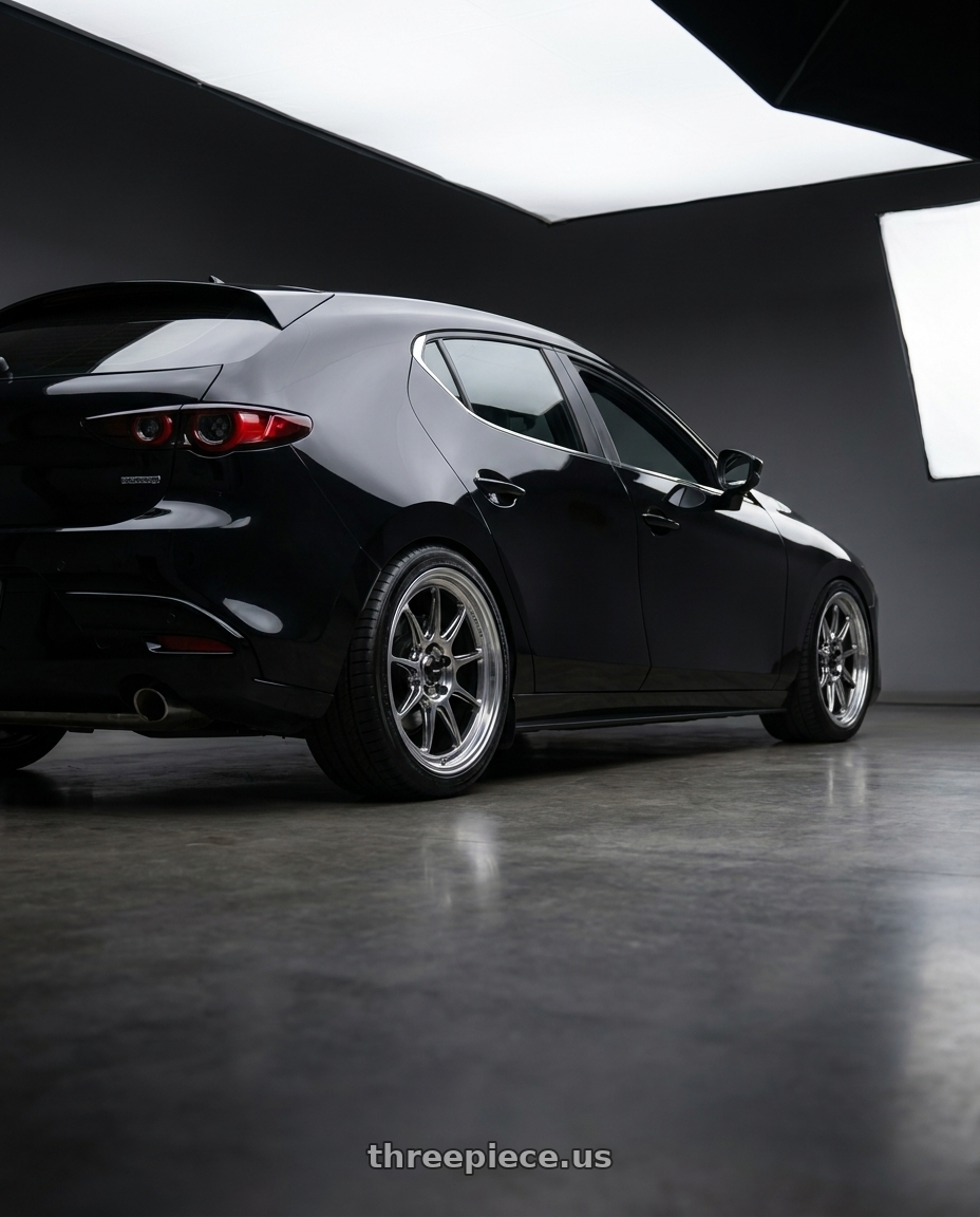 2024 Mazda Mazda3 with Konig Countergram 5x114.3 18x8.5+35 Hyper Chrome / Machined Lip wheels rear three quarter view square tires