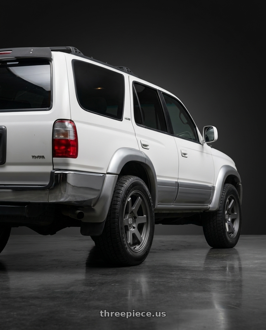 1997 Toyota 4Runner with Level 8 MK6 6X139.7 17X9 -12 MATTE GUNMETAL wheels rear three quarter view square tires