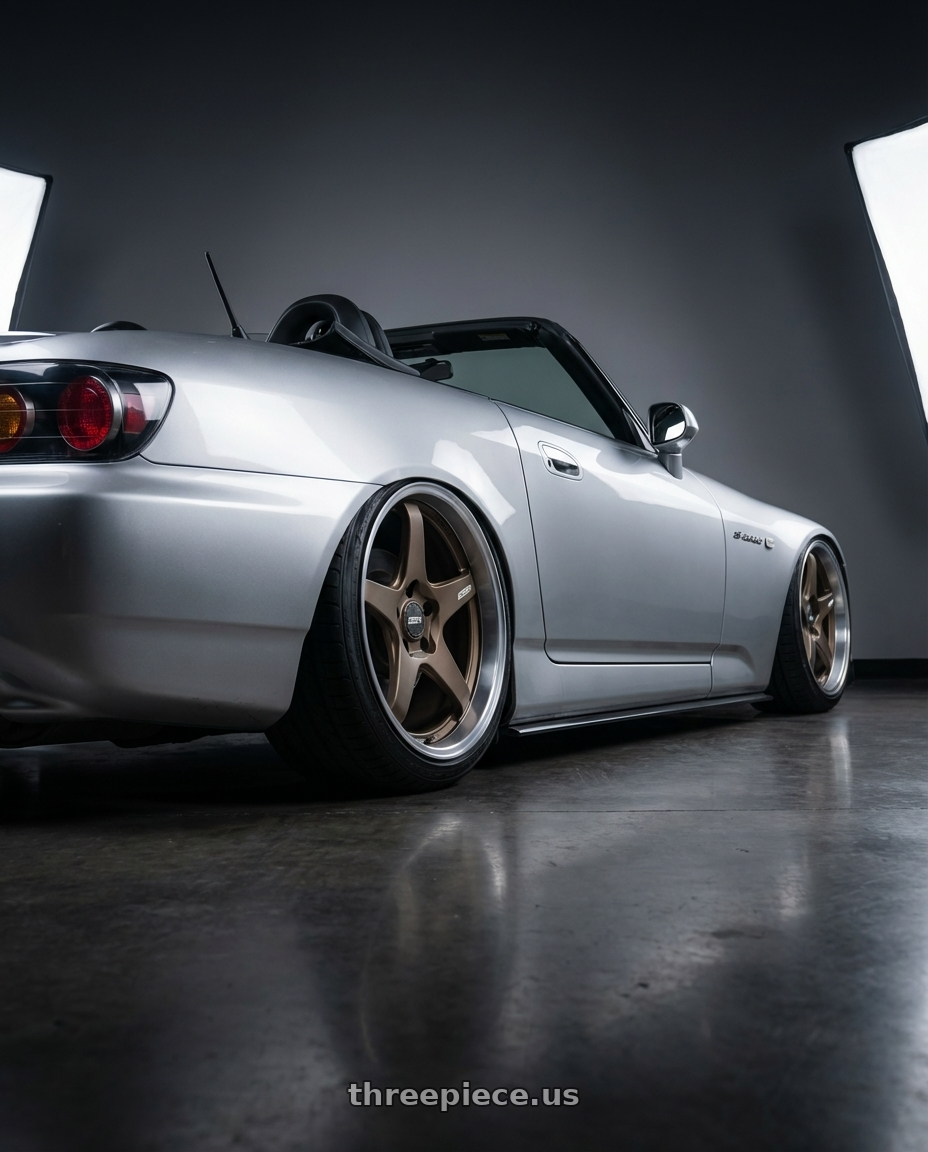 2009 Honda S2000 with ESR Wheels APEX SERIES AP5 5x114.3 18x9.5 +22 Matte Bronze wheels rear three quarter view slight stretch tires