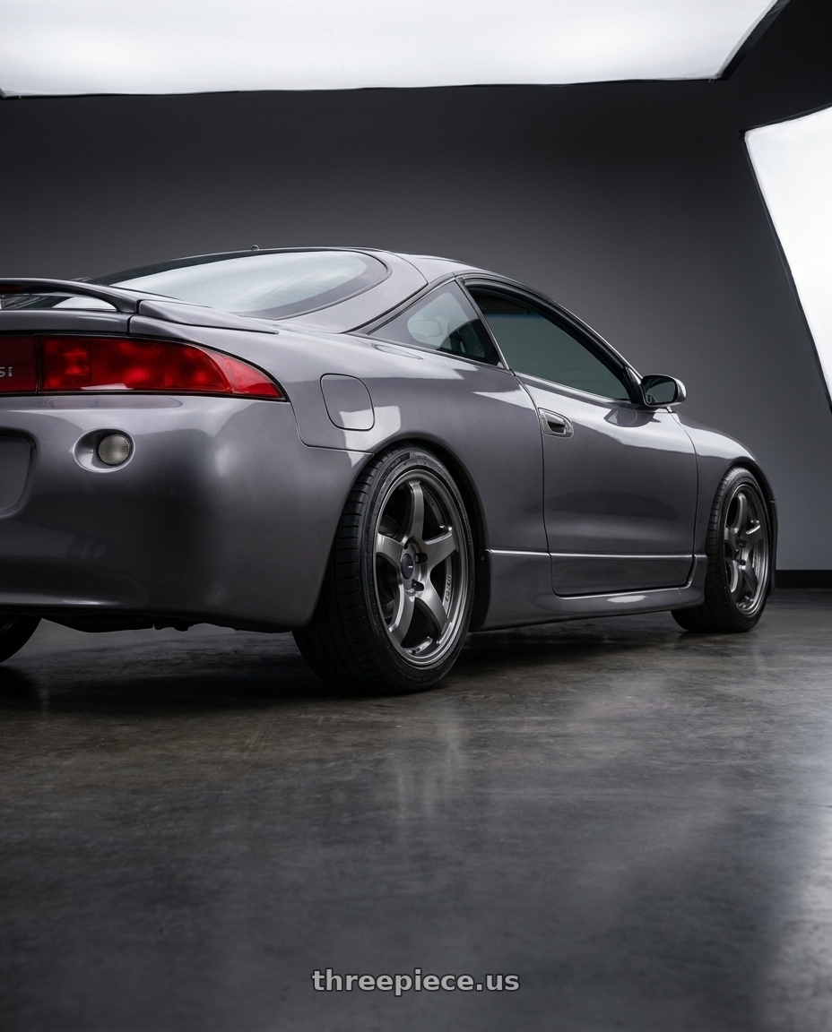 1997 Mitsubishi eclipse with Enkei PF05 5x114.3 17x9.5+35 Dark Silver wheels rear three quarter view square tires