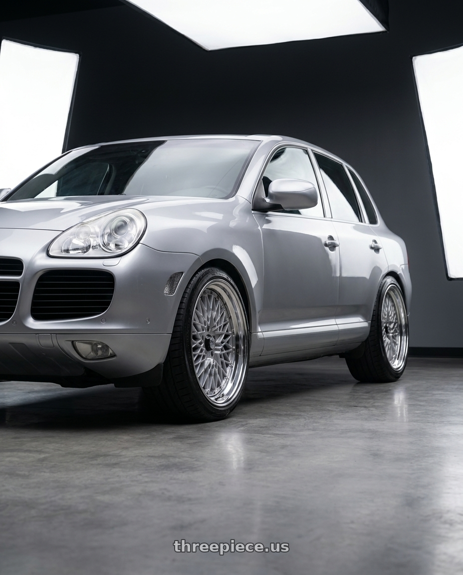 2005 Porsche Cayenne Turbo with SSR Formula MESH 5x130 19X10+49 SL Disk Fm Silver wheels front three quarter view lowered stance