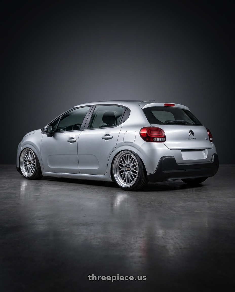 2017 Citroen C3 with BBS LM 5x114.3 18x9.0+42 Diamond Silver wheels rear three quarter view slight stretch tires