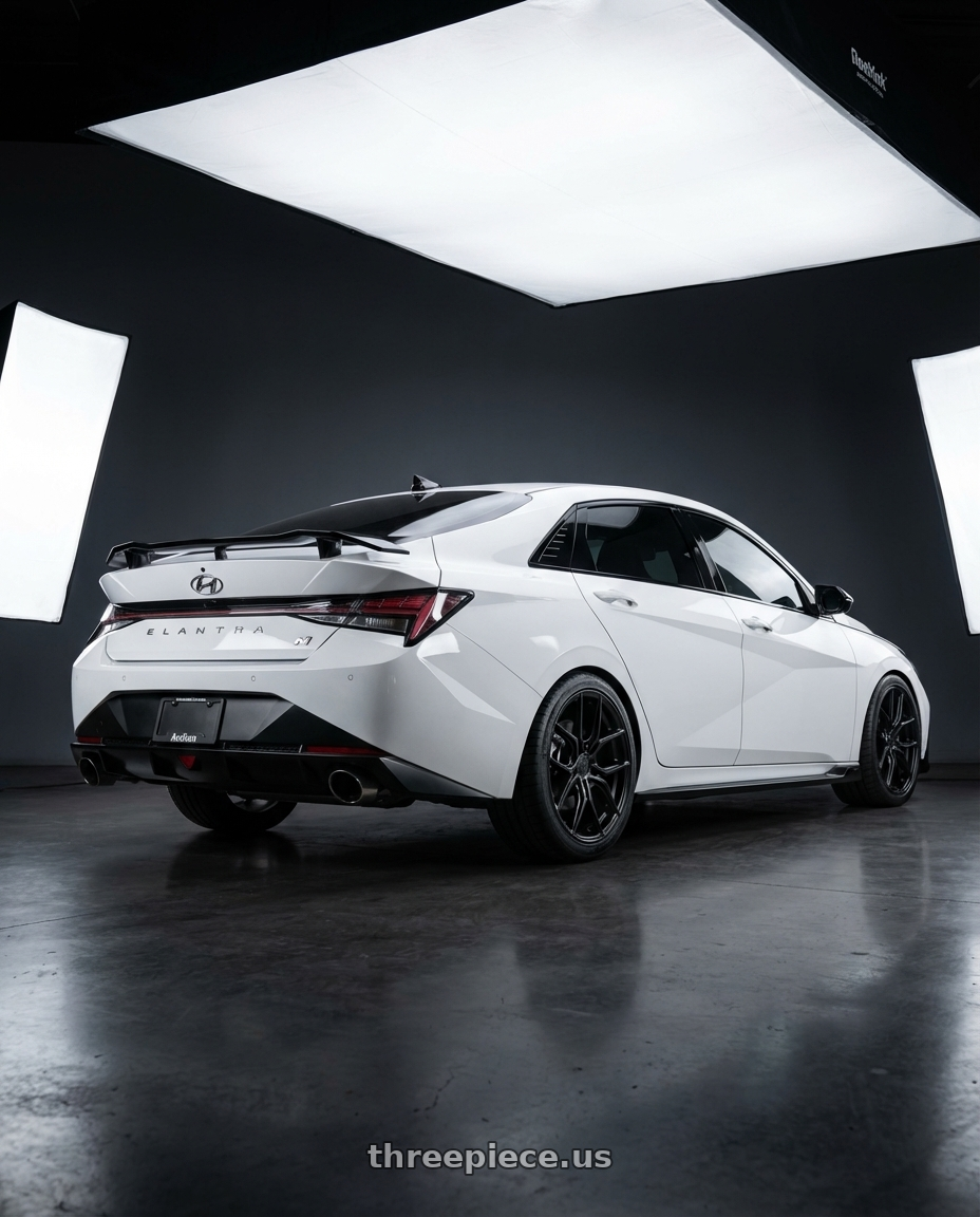 2024 Hyundai Elantra N with Aodhan AFF2 5x114.3 19x8.5+35 Matte Black wheels rear three quarter view square tires
