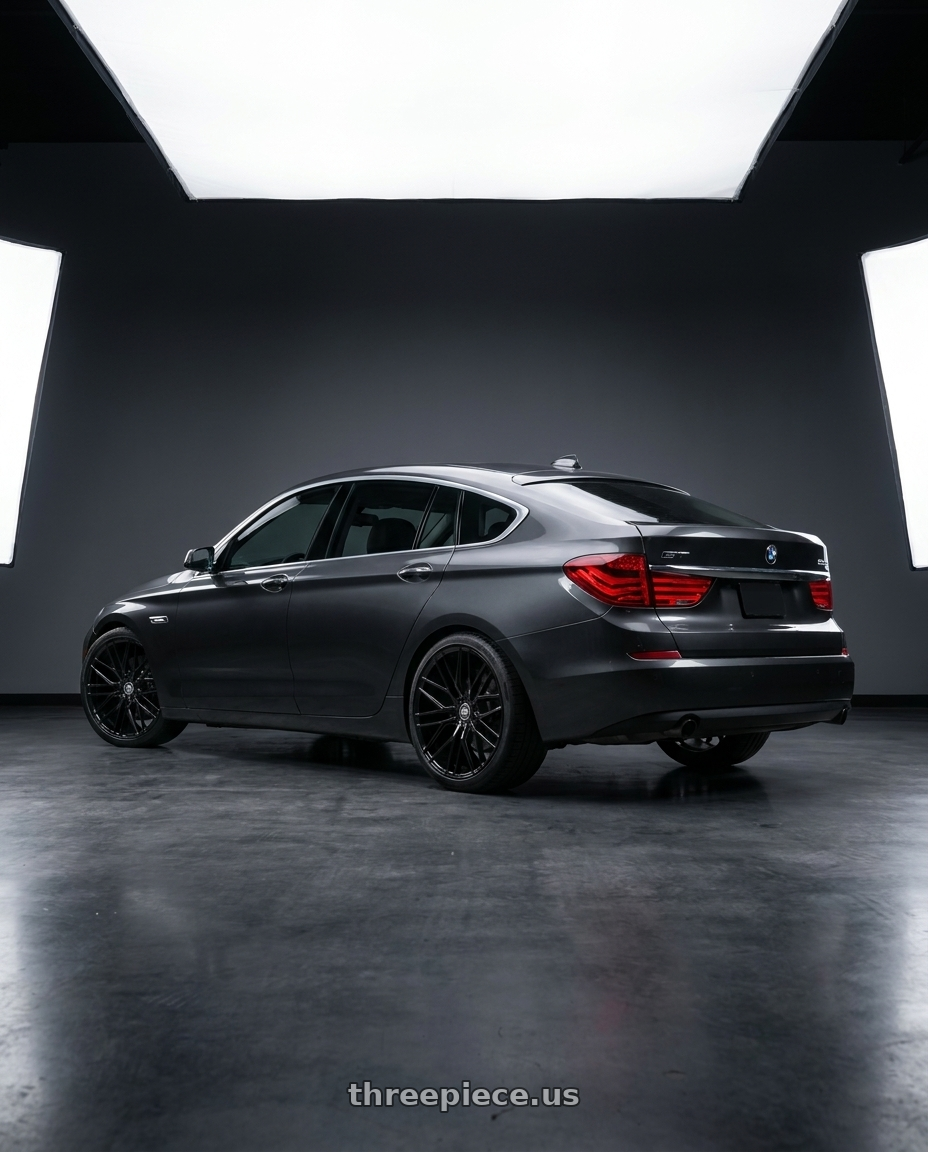 2012 bmw 535i gt with Road Force RF13 5x120 22x10.5+42 GLOSS BLACK wheels rear three quarter view square tires