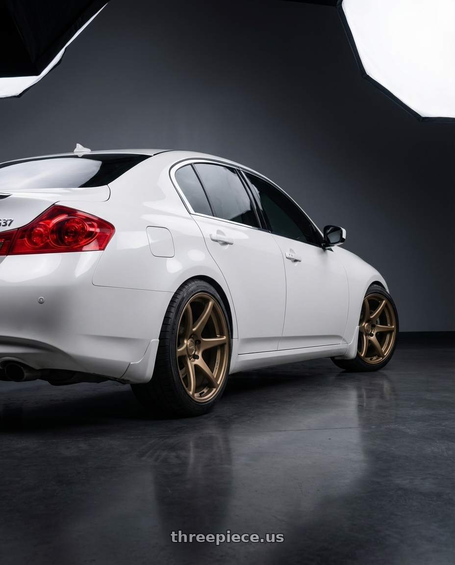 2014 Infiniti G37 Coupe with Kansei K11B Tandem 5x114.3 19x9.5 22 Bronze wheels rear three quarter view square tires