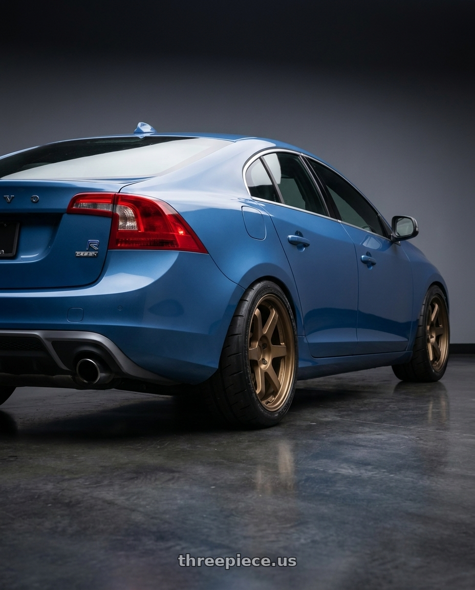 Volvo 2015 s60 r design with 9six9 SIX-1 5x108 18X8.5 +35 Matte Bronze wheels rear three quarter view square tires