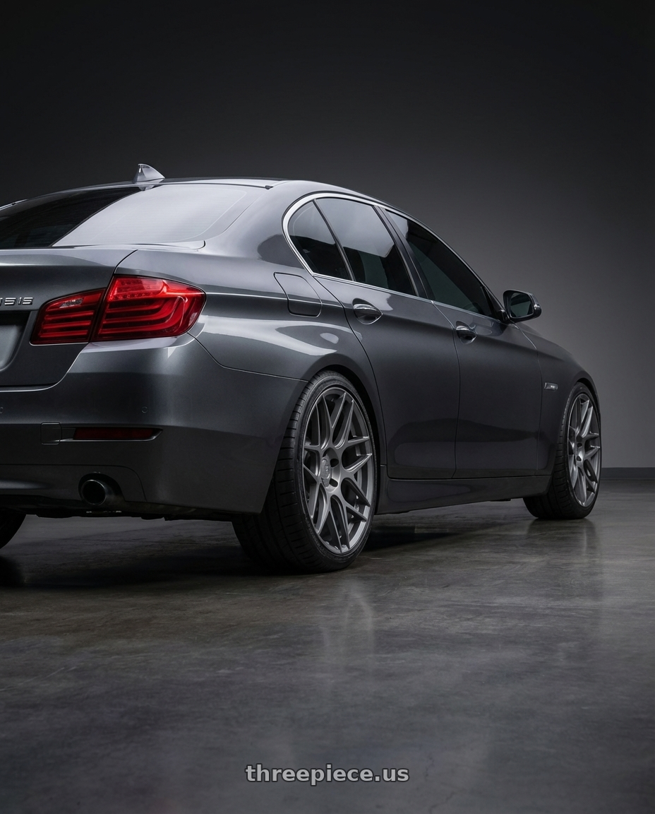 2016 BMW 5 Series F10 with Aodhan AFF2 5x120 19x9.5+35 Matte Gray wheels rear three quarter view square tires