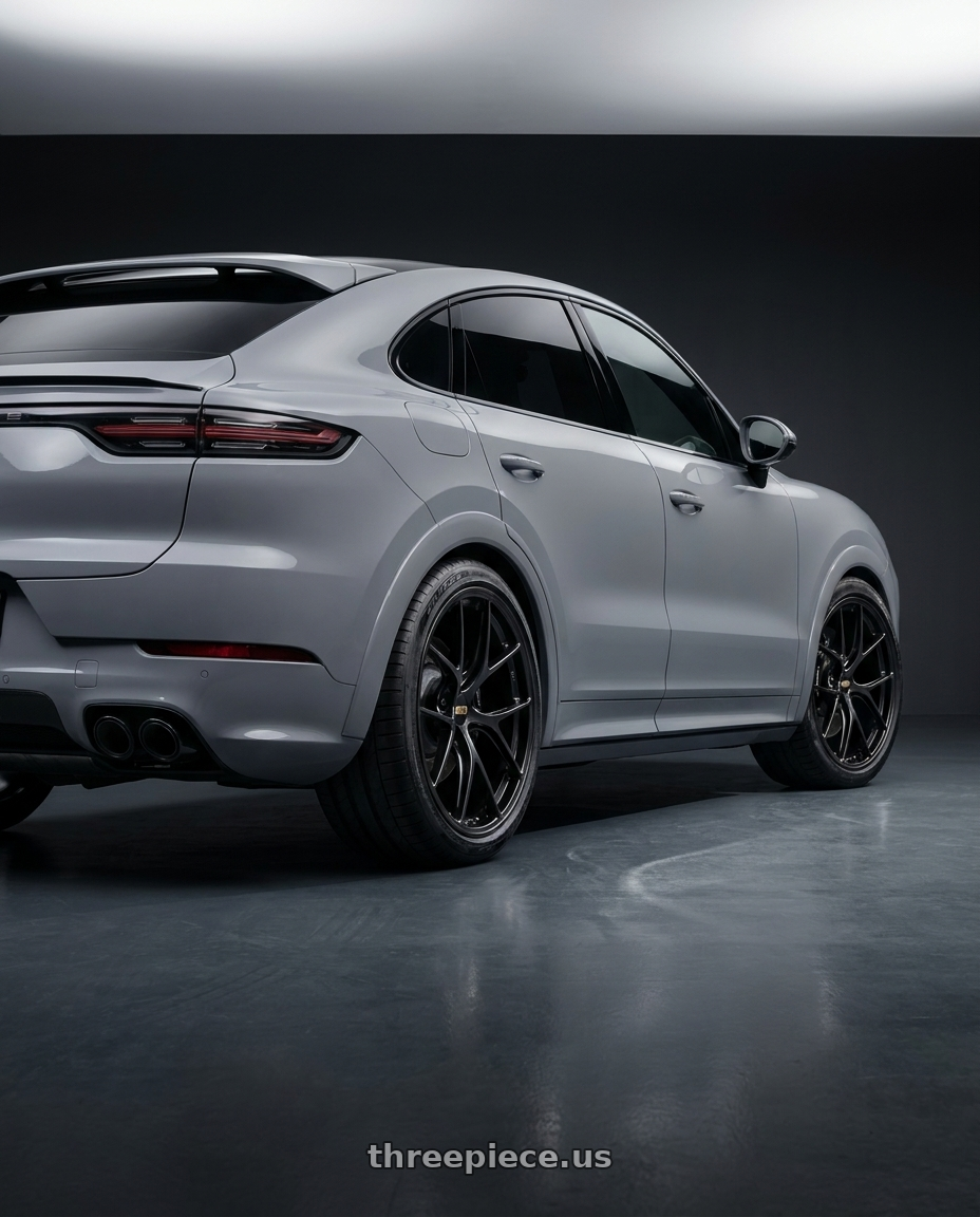 cayenne s 2024 with BBS RI-D 5x112 21x10.5 +10 Diamond Black wheels rear three quarter view square tires