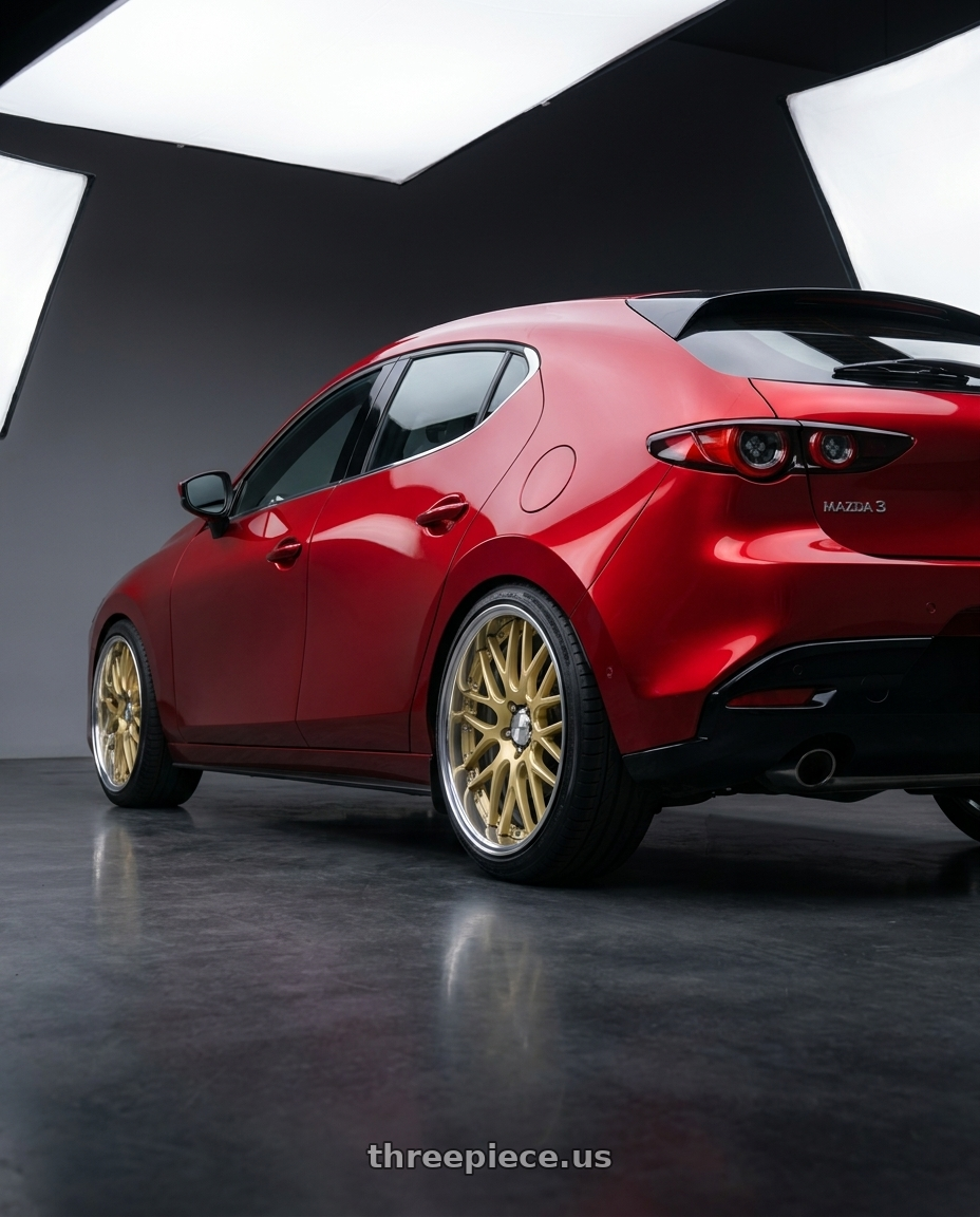 2024 Mazda 3 with Work Lanvec Lm1 5x114.3 18x8.5+45 A Disk Light Metallic Gold wheels rear three quarter view slight stretch tires