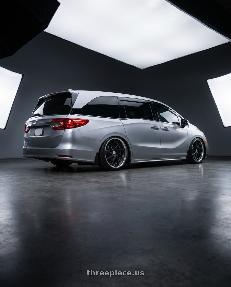 2024 Honda Odyssey with Work Gnosis Cvs 5x120 21x8.5+45 O Disk Matte Black wheels rear three quarter view square tires