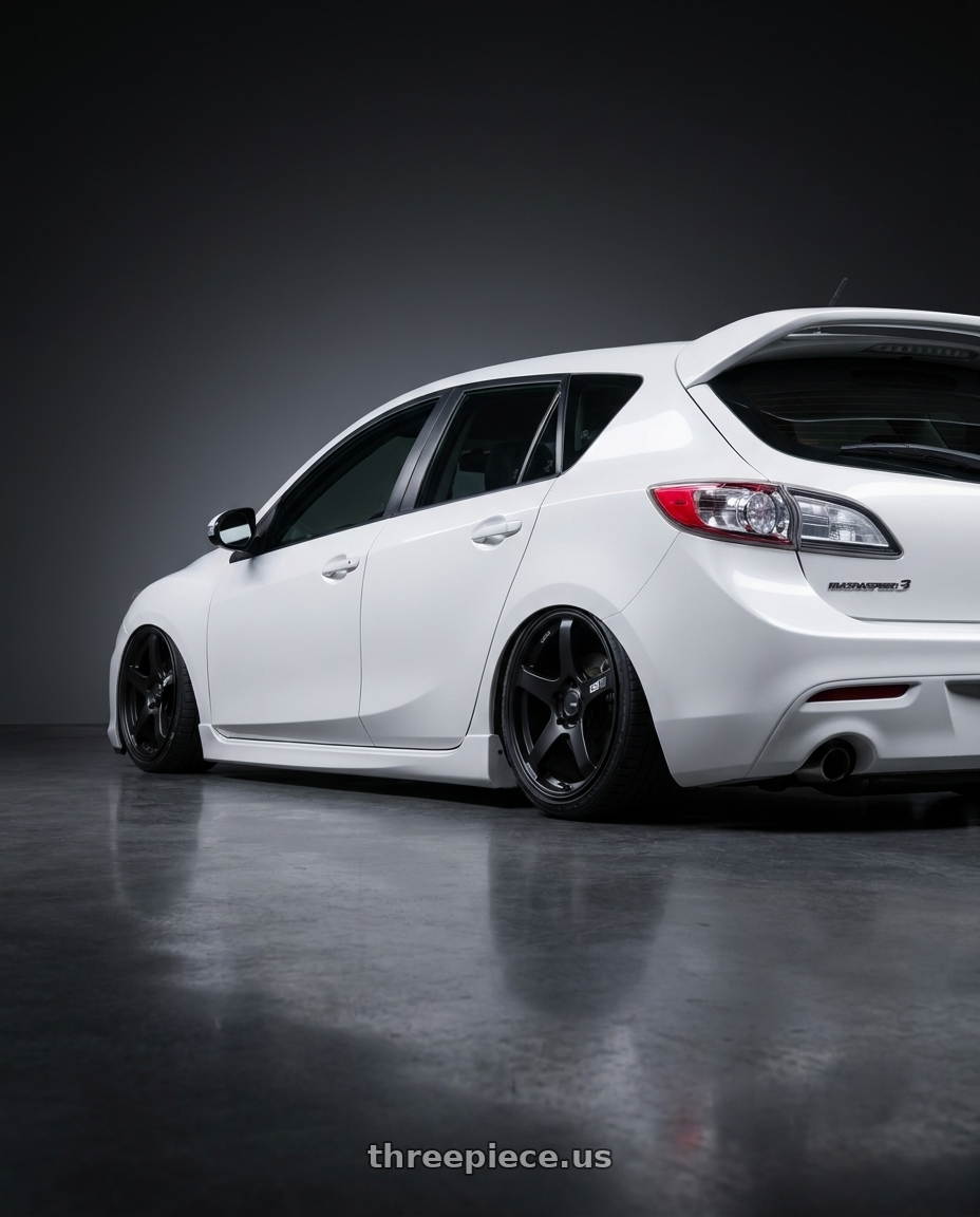2012 Mazda Mazdaspeed3 with Ssr Gtv01 5x114.3 18x8+35  FLAT BLACK wheels rear three quarter view slight stretch tires