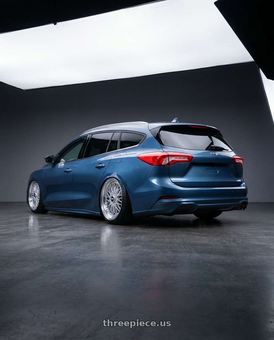 2023 focus wagon mk4.5 Blue Metallic with BBS Super-RS 5x112 19x9.0+42 Silver wheels rear three quarter view slight stretch tires