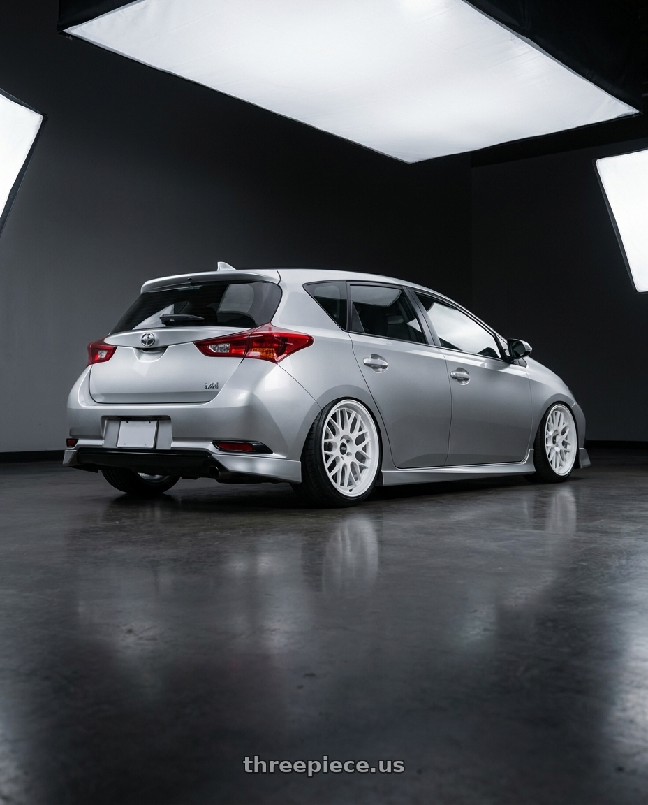 2016 Scion iM with ESR Wheels APEX SERIES APX01 5x100 18x8.5 +35 Gloss White wheels rear three quarter view slight stretch tires