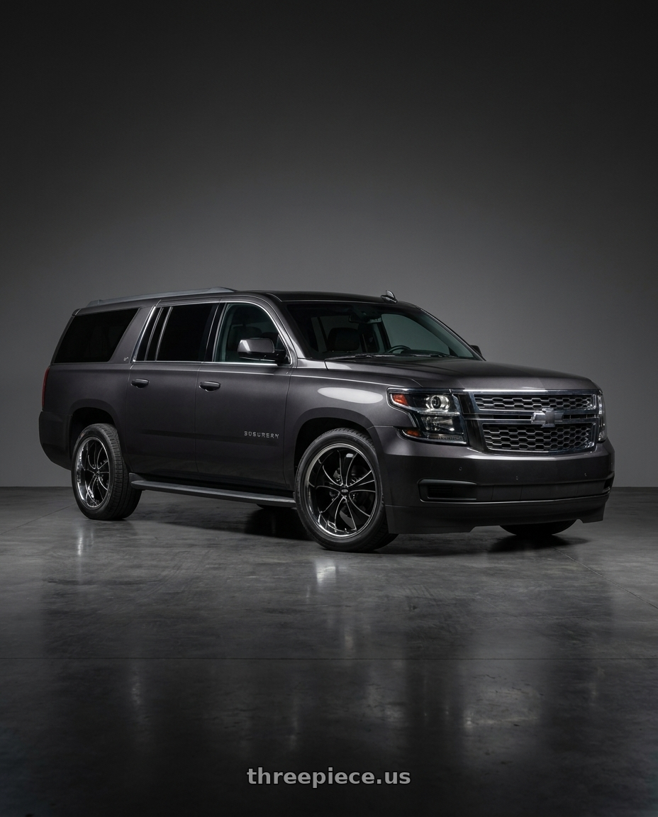 2015 Chevy Suburban LT. Dark grey  with Strada Street Classics Old Skool 6x139.7 24x10 +24 Gloss Black Milled SS Lip wheels
