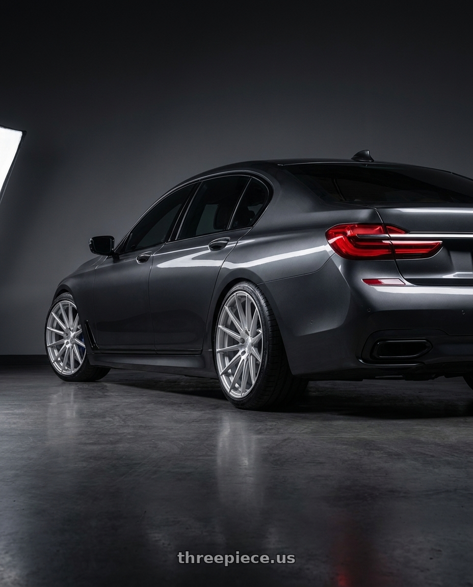 2019 bmw 750i with Avant Garde Wheels M615 5X112 22x10.5 +34 Silver Machine wheels rear three quarter view slight stretch tires