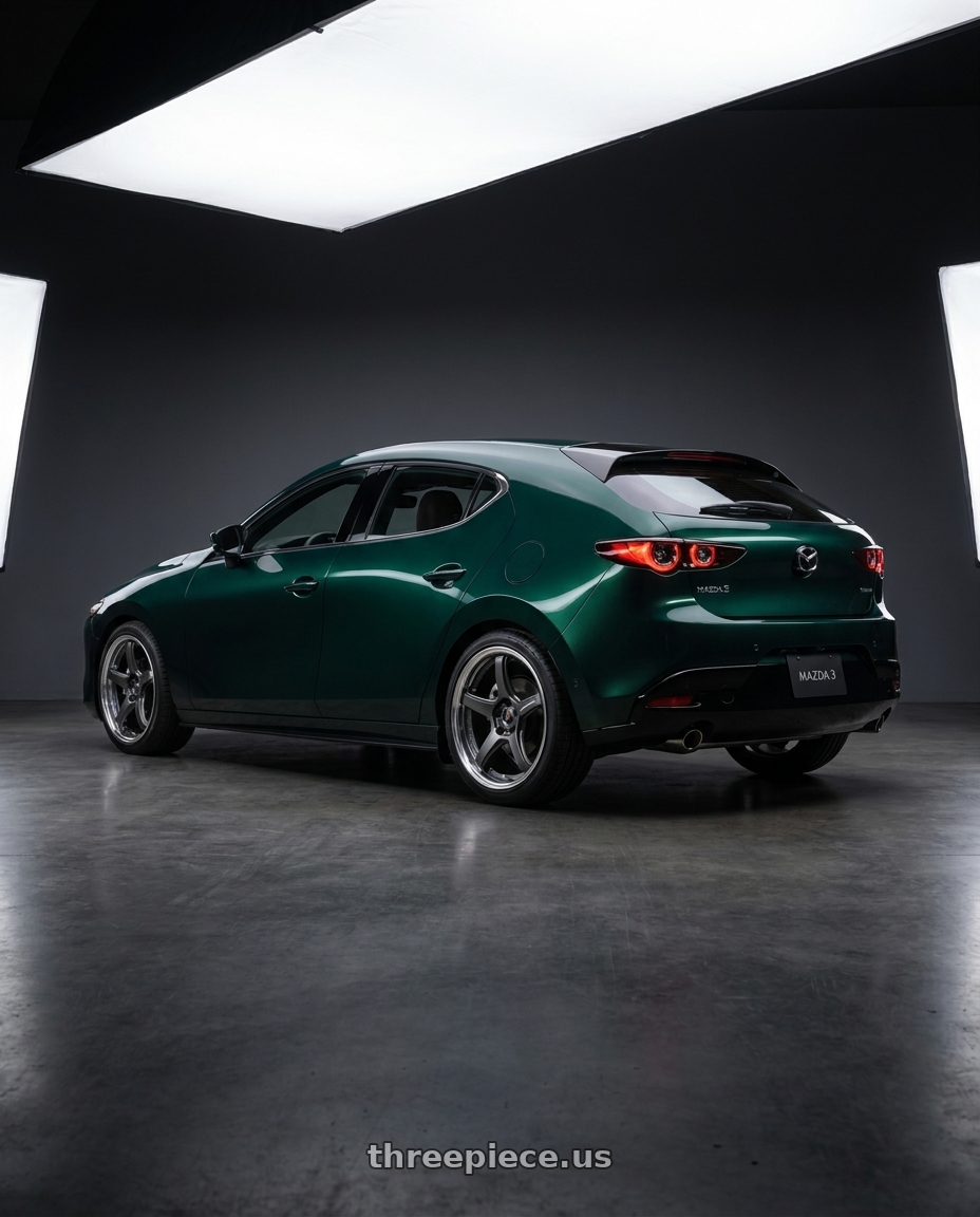 2026 Mazda 3 with Work T5R 2P 5x114.3 18x8.5 +38 Matte Gunmetal wheels rear three quarter view square tires