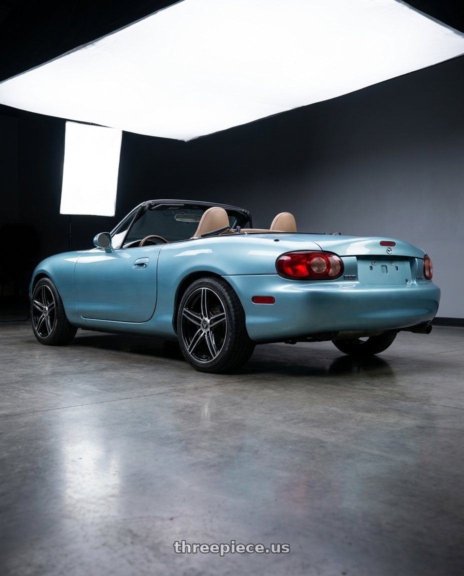 2002 Mazda Miata with WHITE DIAMOND W3143 4x100 14x6 +35 Black Machined wheels rear three quarter view square tires