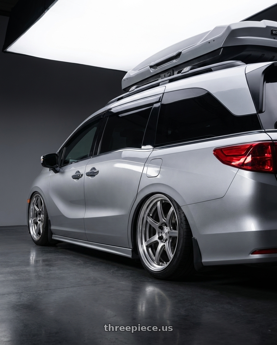 2024 Honda Odyssey with Work T7r 2P 5x120 20x8.5 +45 GT SILVER wheels rear three quarter view slight stretch tires
