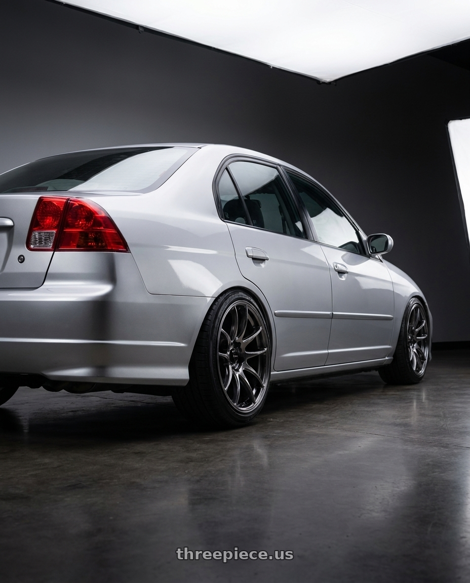 2002 Honda civic with Vors TR4 5x100 17x8  +35 Hyper Black wheels rear three quarter view slight stretch tires