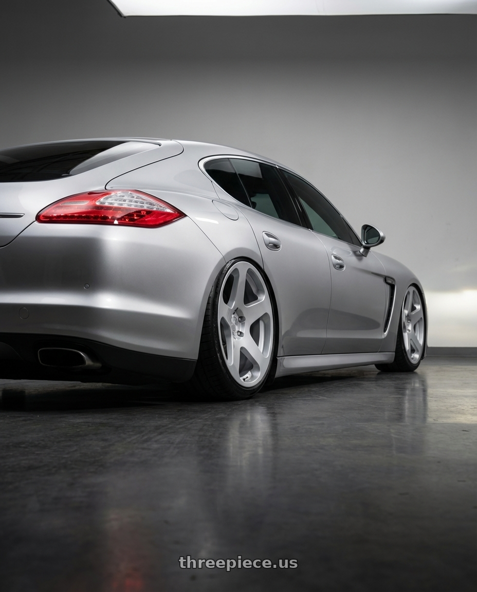 2012 Porsche Panamera  with Rotiform RC200 NUE 5X120 20x10 +40 GLOSS SILVER wheels rear three quarter view slight stretch tires