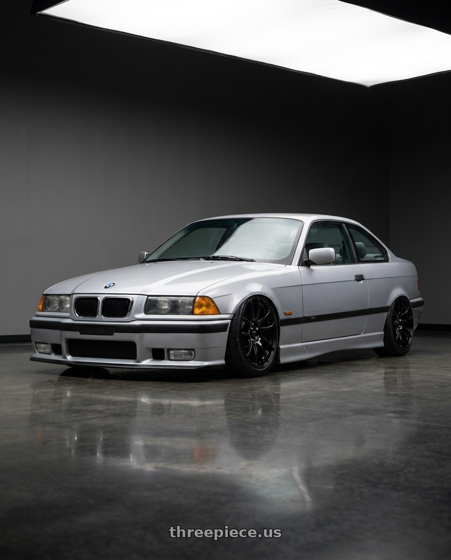 1999 BMW 328is with Vors TR4 5x120 17x9  +30 Gloss Black wheels front three quarter view stanced stance